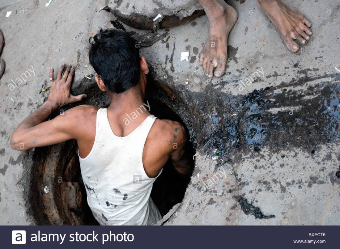 a-man-cleans-sewers-delhi-this-work-is-traditionally-done-by-dalits-bxect6